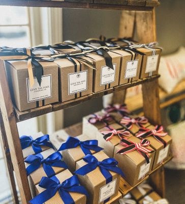 Gift boxes tied with ribbons on a shop display