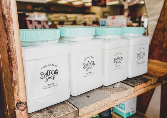Candles displayed on a gift shop shelf